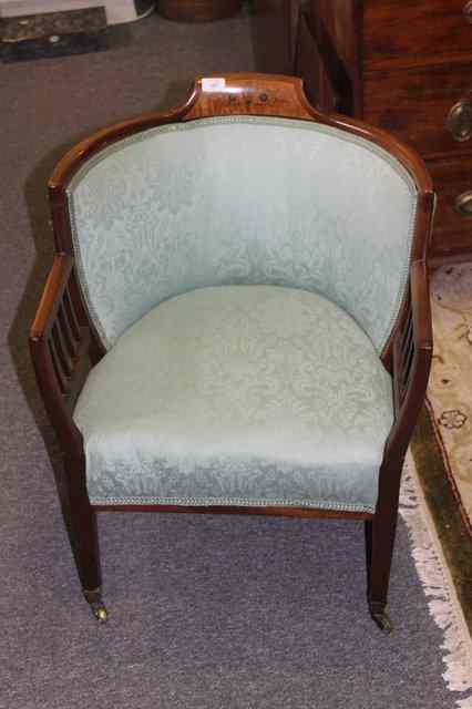 Appraisal: AN EDWARDIAN MAHOGANY AND SATINWOOD INLAID TUB ARMCHAIR with green