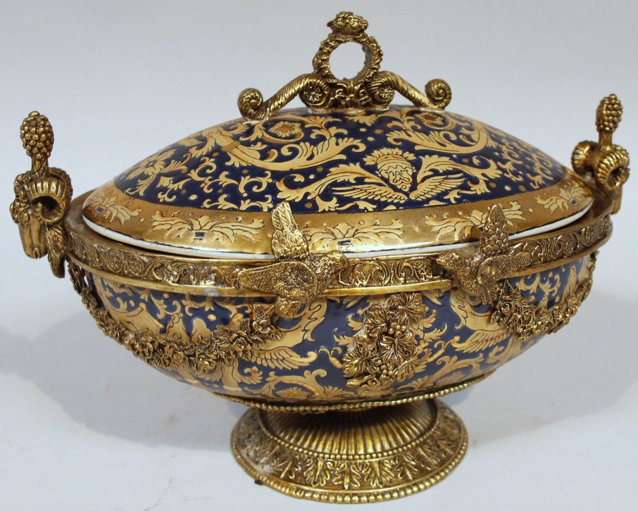 Appraisal: A thC earthenware and gilt metal covered dish of oval