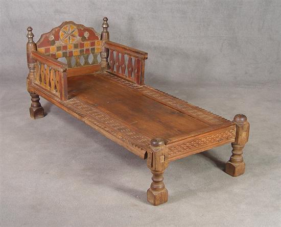 Appraisal: Carved European Child's Bed th Century Northern European Geometric headboard