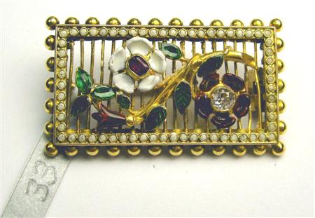 Appraisal: An early th century enamelled and multi-gem set brooch of