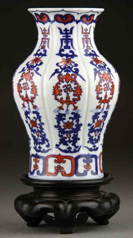 Appraisal: Chinese Iron Red Blue And White Porcelain VaseThe eight lobed