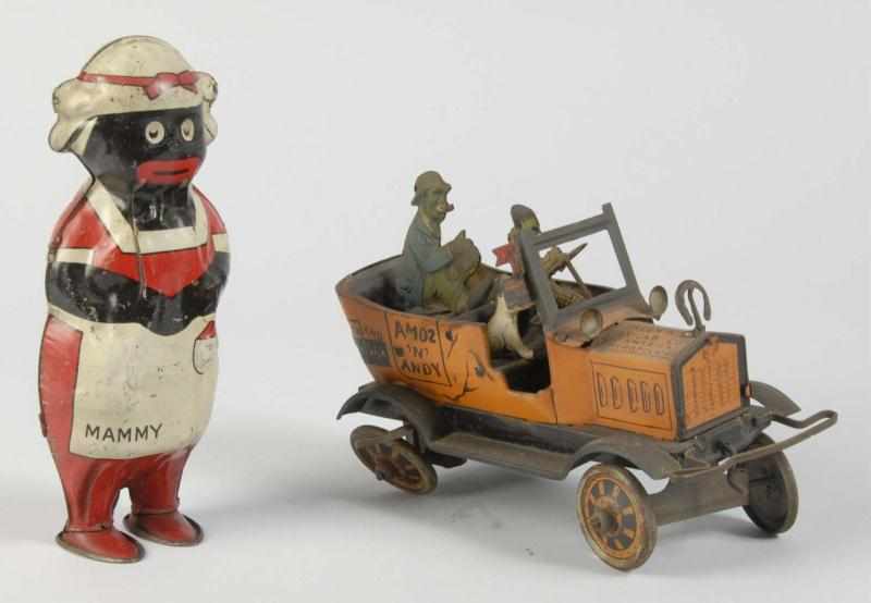 Appraisal: Lot of Tin Litho African American Wind-Up Toys Description American