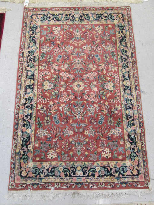 Appraisal: HAND KNOTTED ORIENTAL AREA RUG Indo-Persian overall floral design on