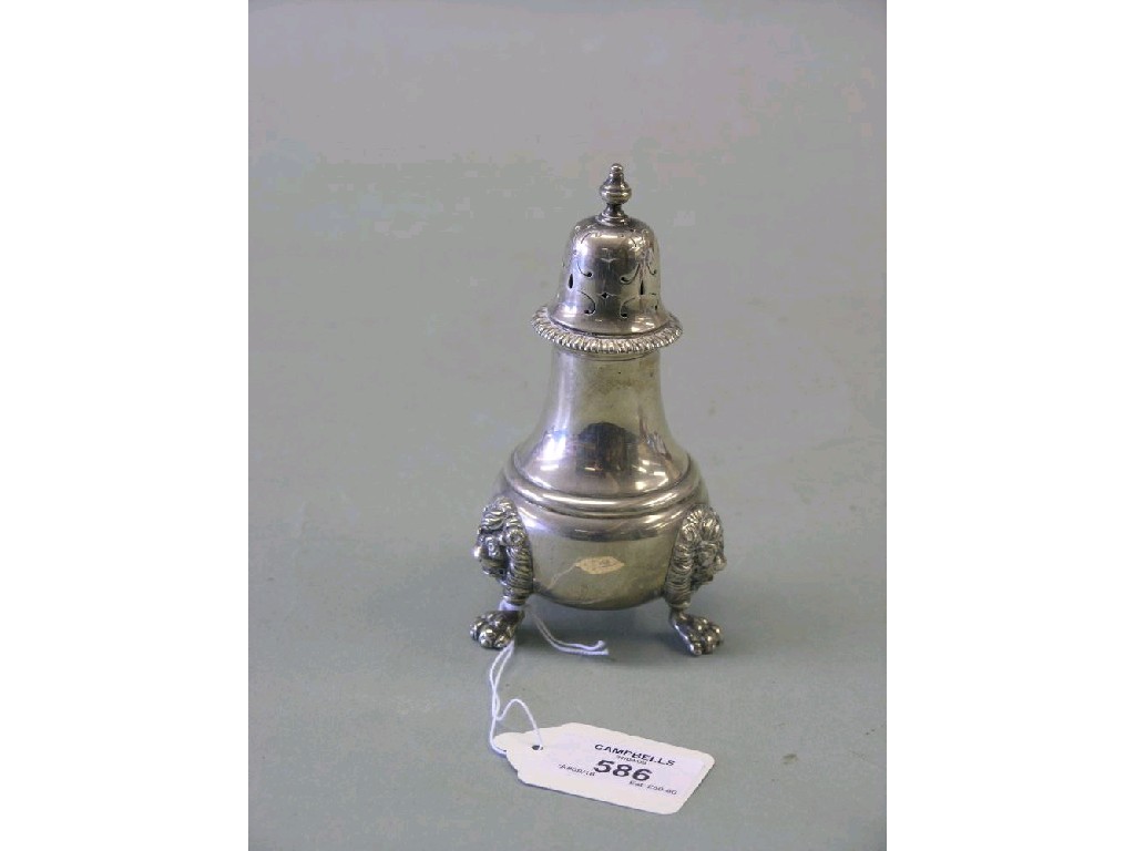 Appraisal: A George VI silver sugar caster on lion paws feet