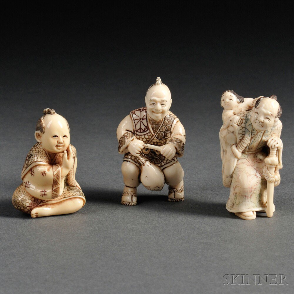 Appraisal: Three Ivory Netsuke of Figures Japan th th century including