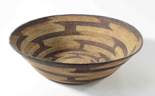 Appraisal: POMO INDIAN BASKET having traditional panels of geometric design diameter