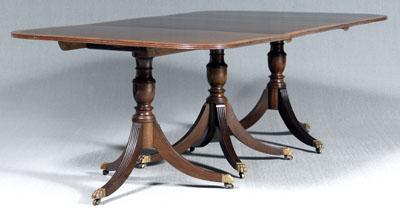 Appraisal: Regency style three-pedestal dining table each pedestal with tilting mahogany