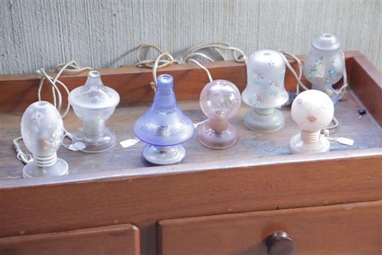 Appraisal: SEVEN CZECHOSLOVAKIAN PERFUME LAMPS WITH ELECTRIC CORDS In a variety