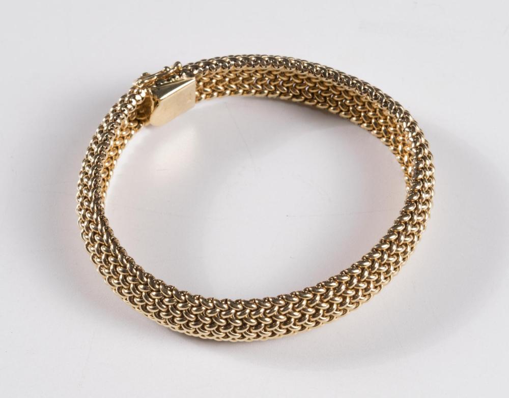 Appraisal: TIFFANY CO FOURTEEN KARAT GOLD MESH BRACELET The yellow gold