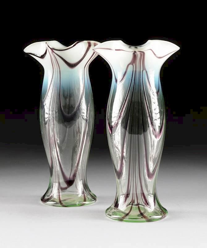 Appraisal: A PAIR OF CLEAR TO OPALESCENT GLASS VASES WITH PURPLE