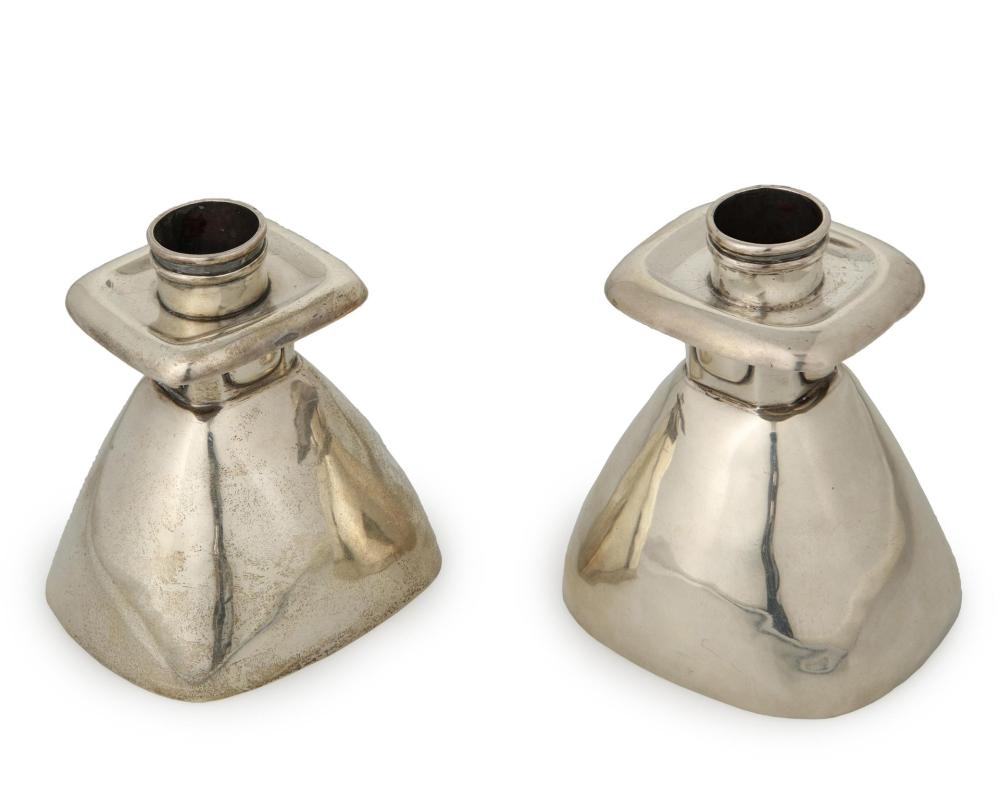 Appraisal: A near-pair of William Spratling sterling silver candlesticks William Spratling