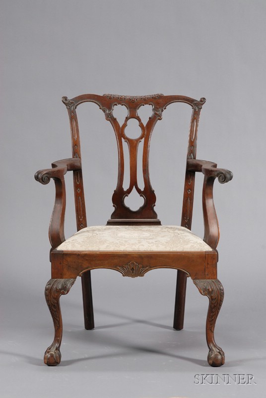 Appraisal: Chippendale-style Carved Mahogany Open Armchair th century with openwork splat