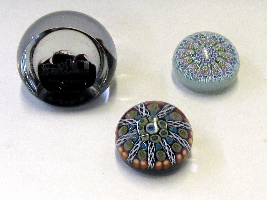 Appraisal: Three glass paperweights to include a Caithness example