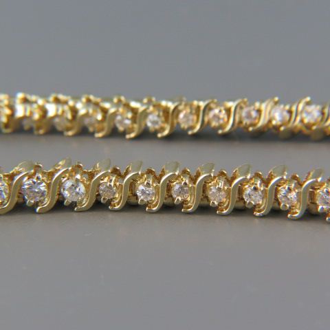 Appraisal: Diamond Necklace diamonds totaling carats in k yellow gold grams