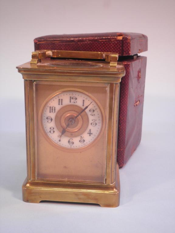 Appraisal: A French brass carriage timepiece with an enamelled dial cm