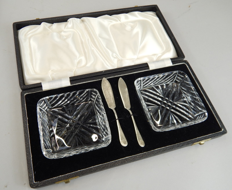 Appraisal: An Elizabeth II butter serving set comprising two square cut