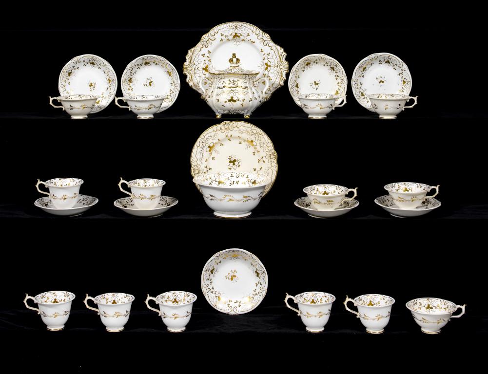 Appraisal: A ROCKINGHAM GILT TEA AND COFFEE SERVICE of three spur