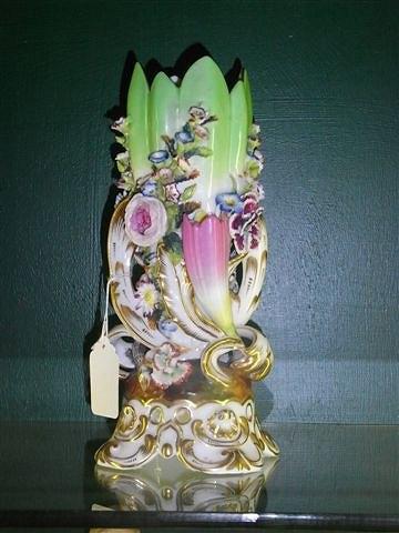 Appraisal: A JACOB PETIT FLOWER ENCRUSTED VASE with gilt scroll base