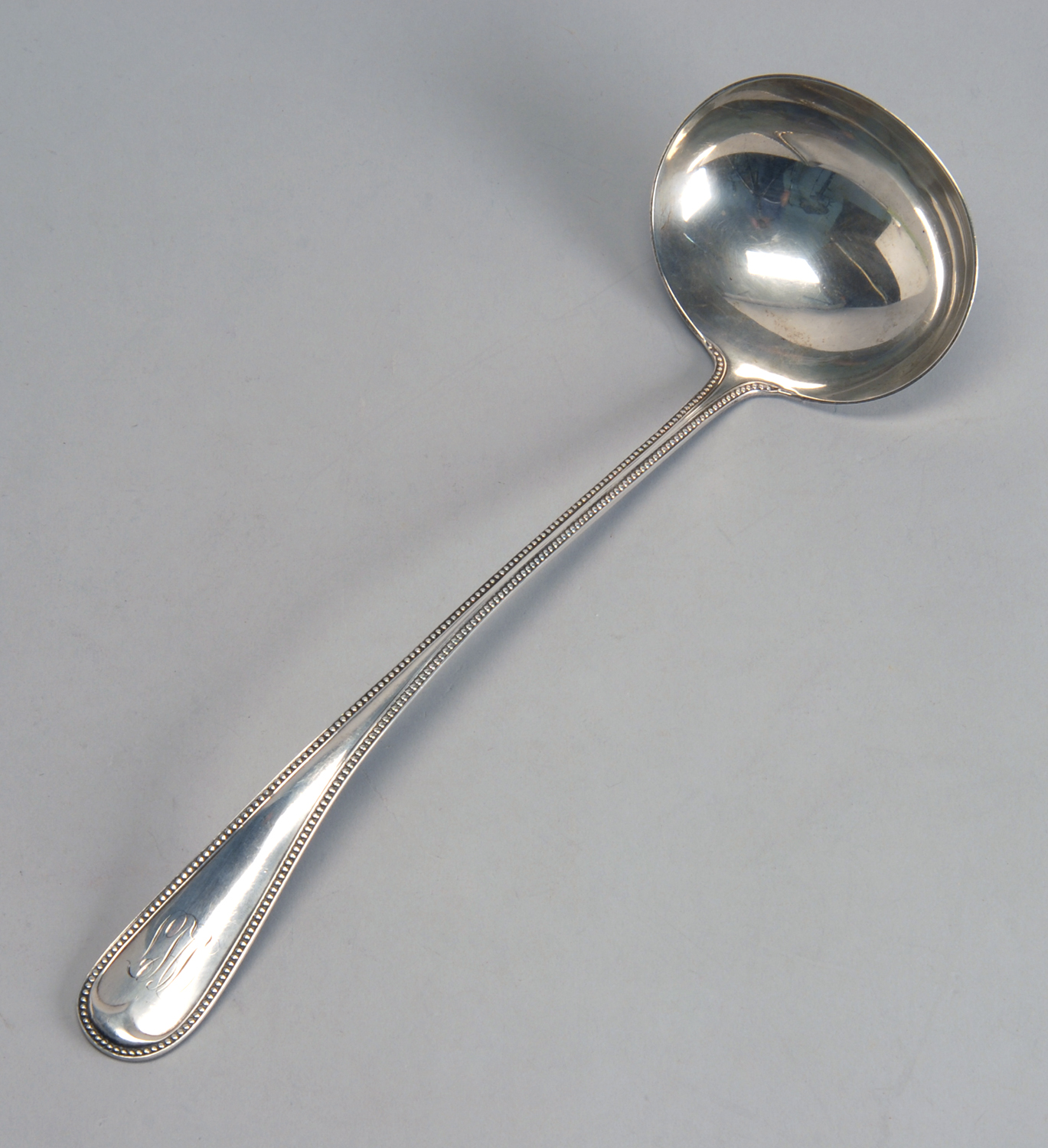 Appraisal: STERLING SILVER SOUP LADLE BY DURGIN DIV OF GORHAM MFG