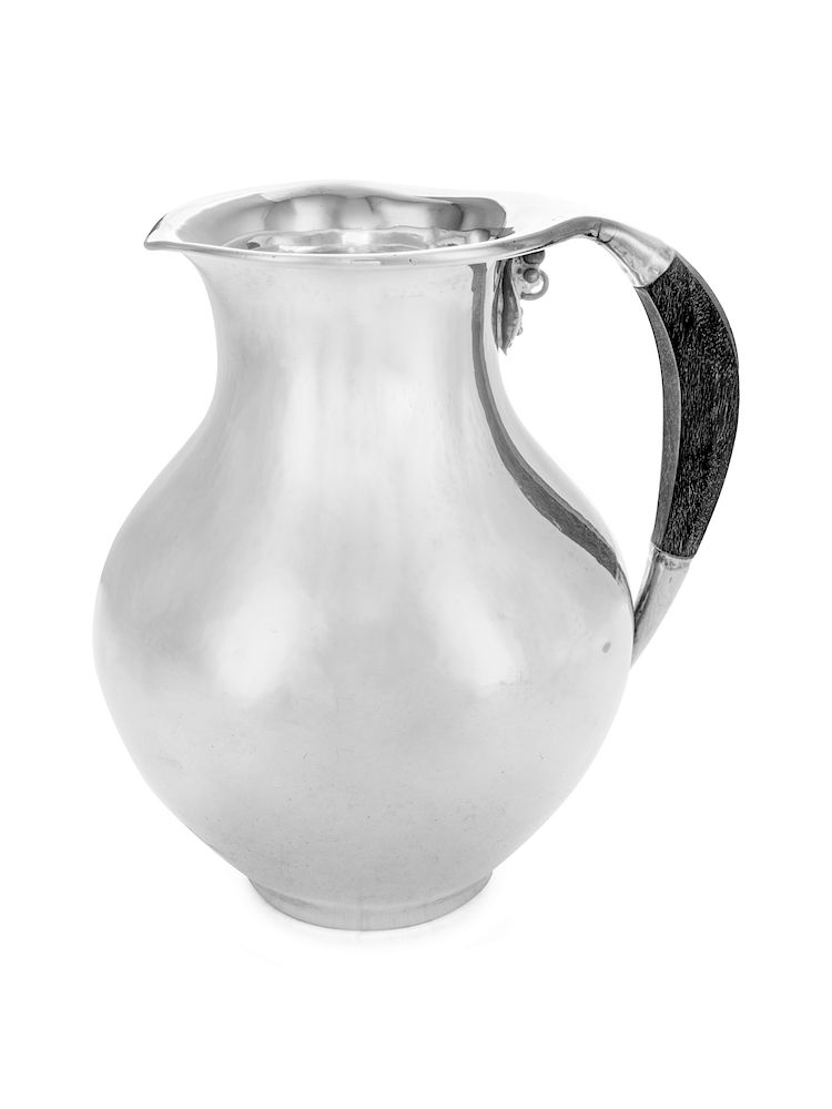 Appraisal: A Danish Silver Water Pitcher A Danish Silver Water Pitcher