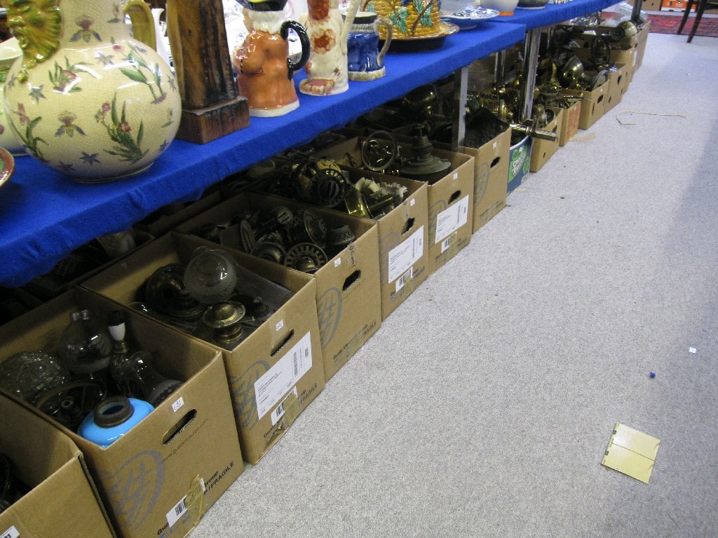 Appraisal: Lot comprising twenty two boxes of oil lamp bases shades