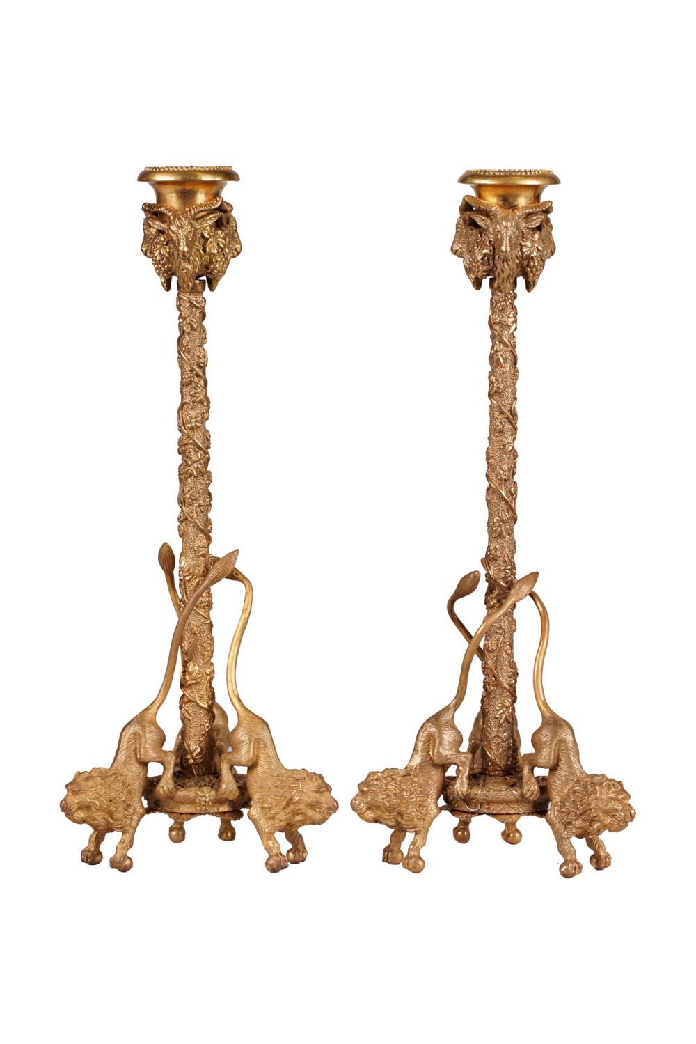 Appraisal: PAIR OF FRENCH STYLE GILT BRONZE CANDLESTICKSwith lion form supports