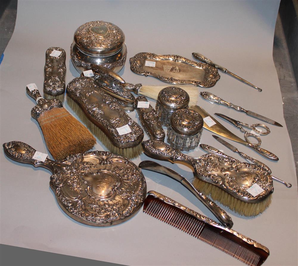 Appraisal: GORHAM SILVER-MOUNTED DRESSER SET including a hand mirror a hair