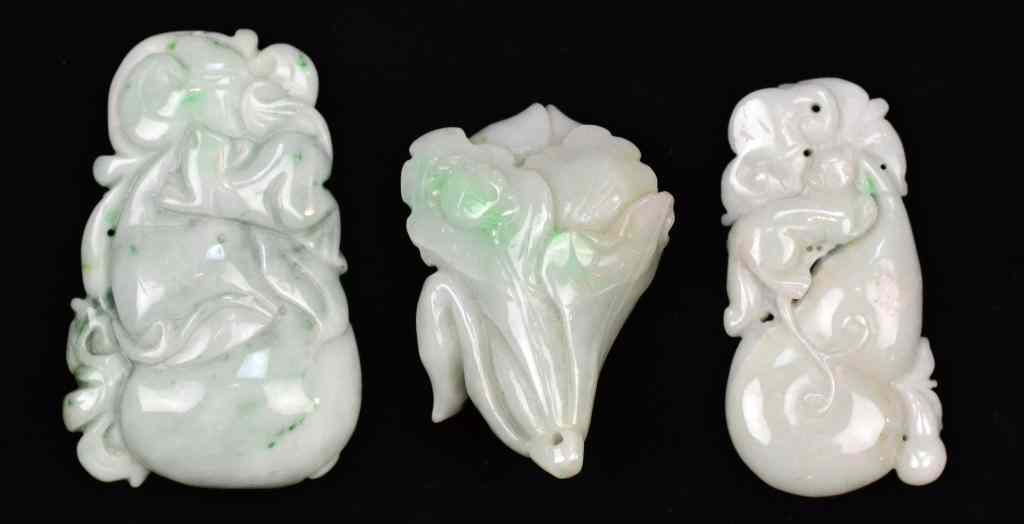 Appraisal: Chinese Carved Jade PendantsTo include two examples of a double