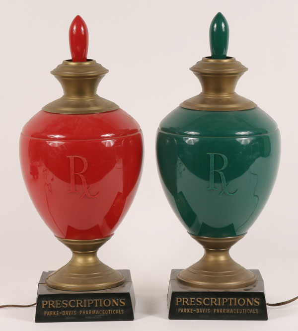 Appraisal: Pair Parke-Davis pharmacy advertising lamps raised lettering H Good condition