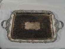 Appraisal: A large Victorian silver plated two handled tray engraved with