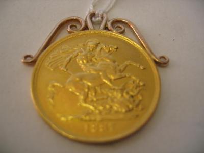 Appraisal: A GOLD TWO POUND COIN dated with soldered loop pendant