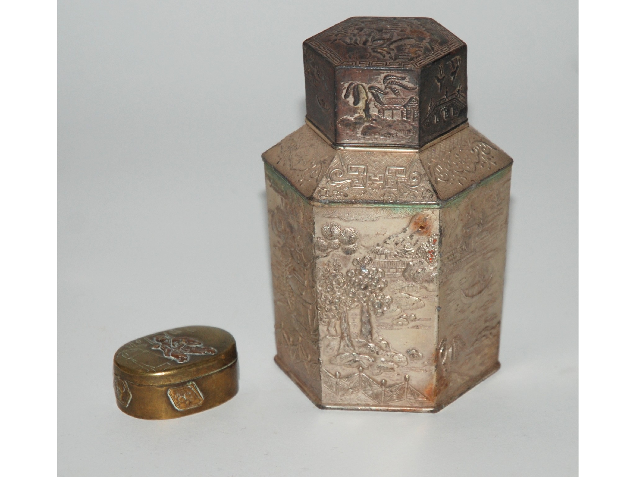 Appraisal: A collection of Japanese related items including white-metal canister oval