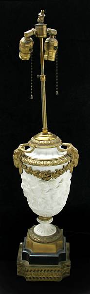 Appraisal: A French bisque porcelain gilt bronze mounted table lamp height