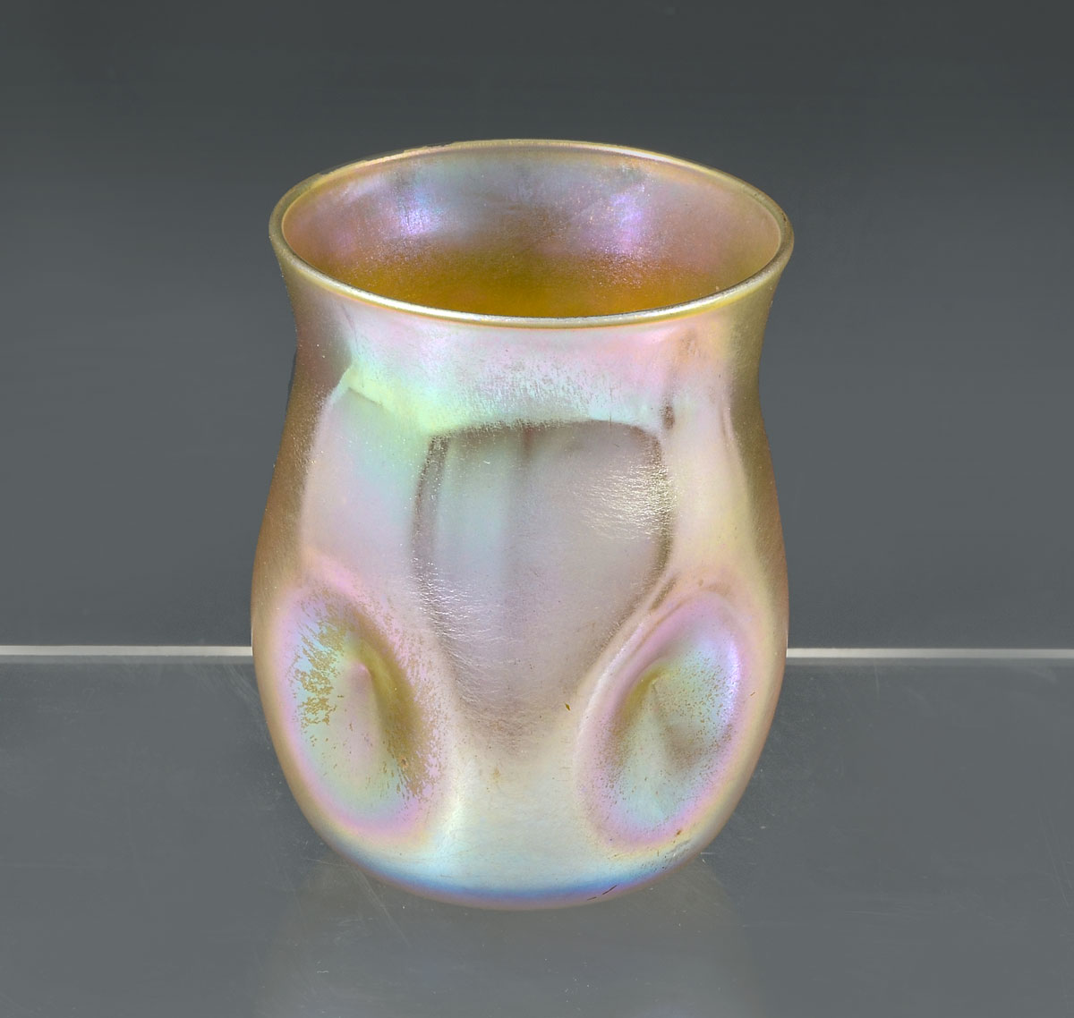 Appraisal: L C TIFFANY DIMPLED VASE Iridescent gold glass Tiffany vase