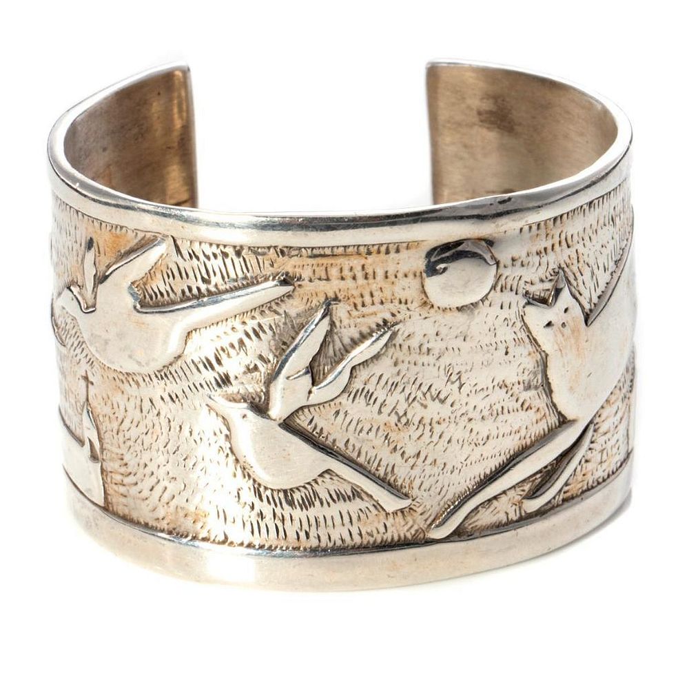 Appraisal: Jim Wagner sterling silver cuff bangle bracelet designed with animals