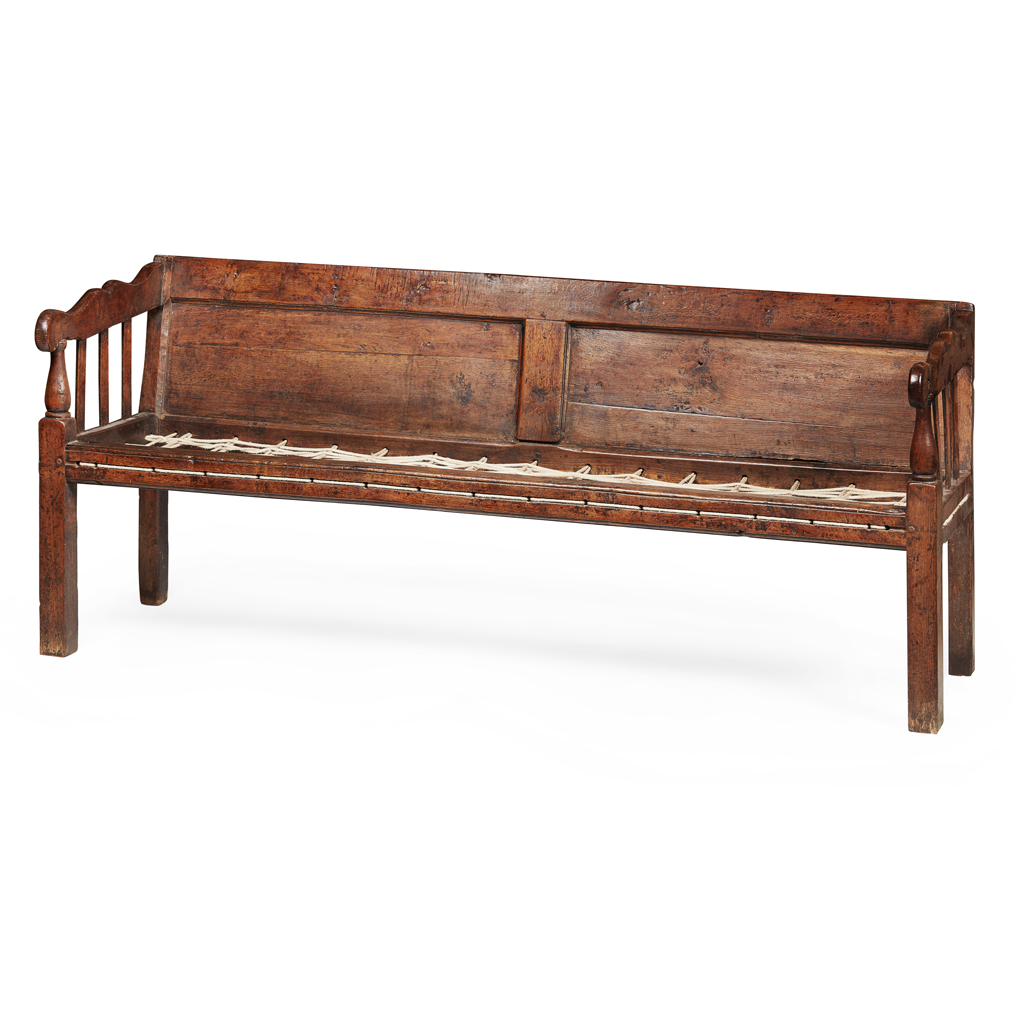 Appraisal: WALNUT SETTLE LATE TH CENTURY with a panelled back and