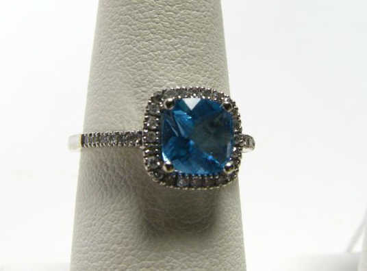 Appraisal: Lady's k white gold ring with cushion cut blue topaz