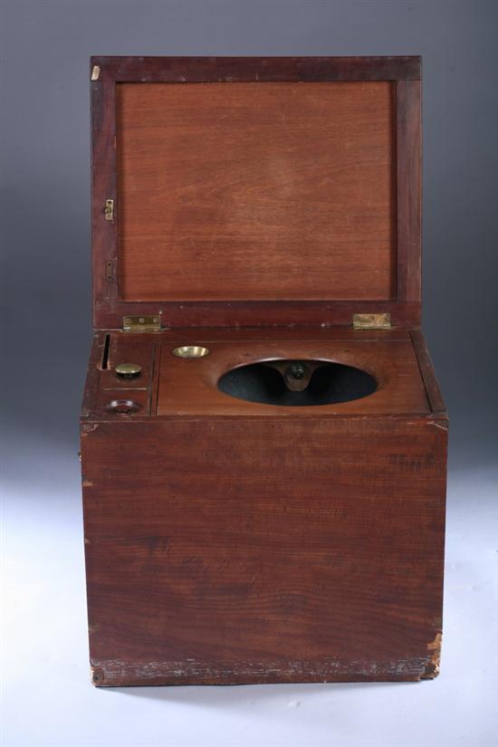 Appraisal: WALNUT HINGED-TOP BOX-FORM COMMODE th century with bail-handle pulls as