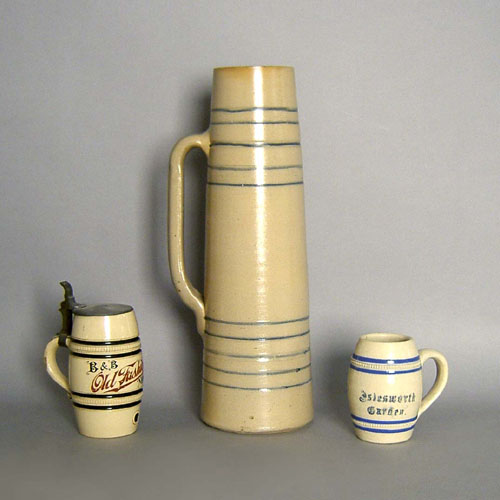 Appraisal: Large stoneware stein h together with mugs