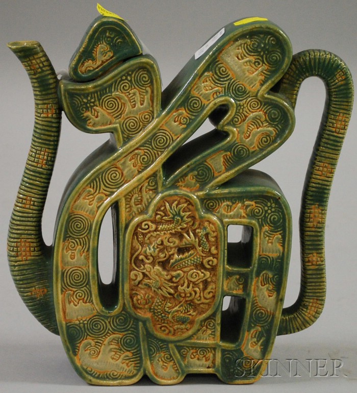 Appraisal: Chinese Glazed Ceramic Character-form Teapot molded into the shape of