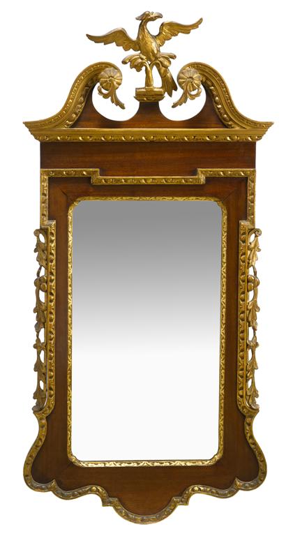 Appraisal: Chippendale-style mahogany and giltwood pier mirrorThe scrolled cornice centering a