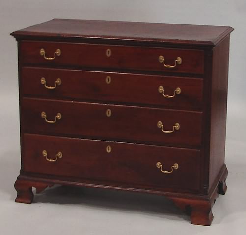 Appraisal: Top with molded border graduated thumb-molded drawers fluted quarter columns