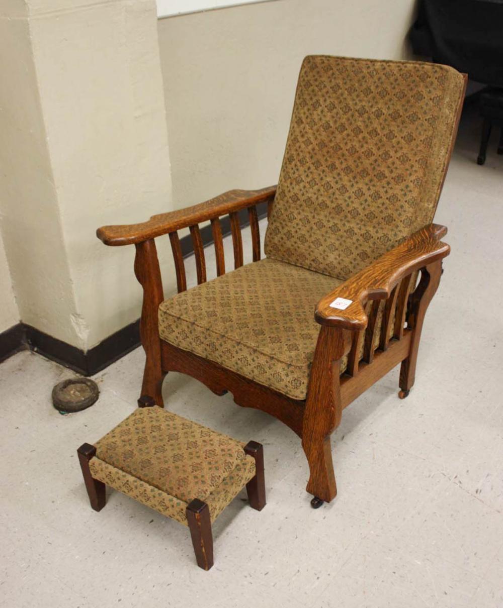 Appraisal: OAK MORRIS ARMCHAIR WITH FOOTSTOOL American c adjustable reclining back