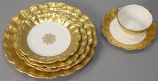 Appraisal: Large Limoges porcelain dinner set with thick gold border pieces