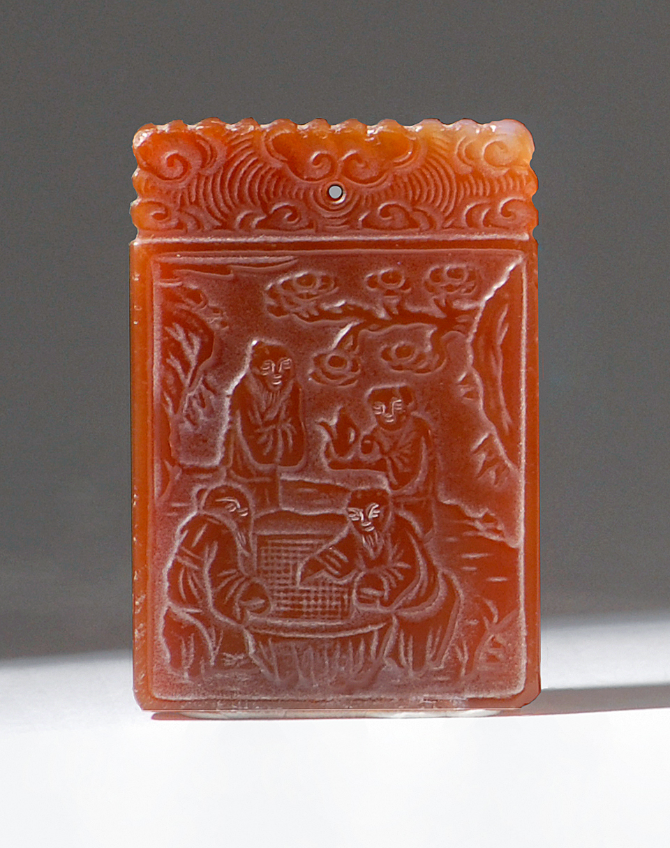 Appraisal: CARNELIAN AGATE PENDANT In rectangular form With relief carving of