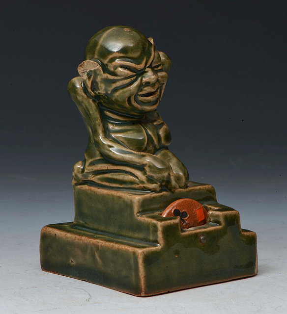 Appraisal: A Doulton 'Booby' trump whist marker in the form of