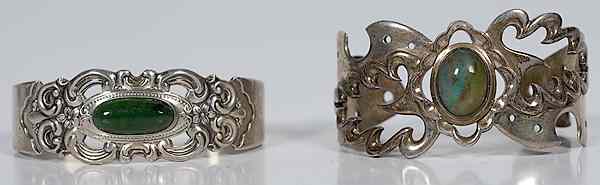 Appraisal: Sterling Cuff Bracelets American two cuff bracelets with center inset