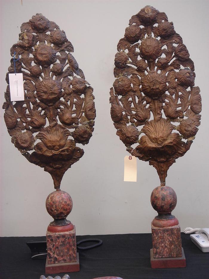 Appraisal: Pair of embossed brass floral form fire screens mounted on