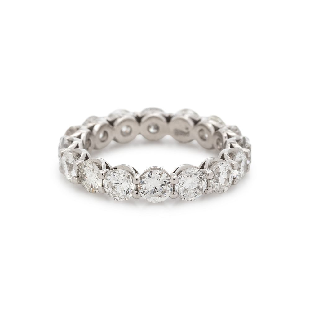 Appraisal: DIAMOND ETERNITY BAND DIAMOND ETERNITY BAND Containing round brilliant cut