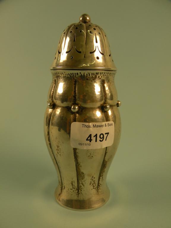 Appraisal: A Danish silver sugar castor of hammered form by Christian